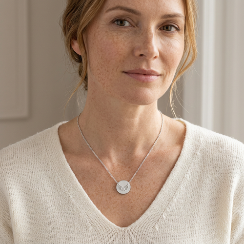 Born to Rise Silver-Tone Wings Disc Necklace